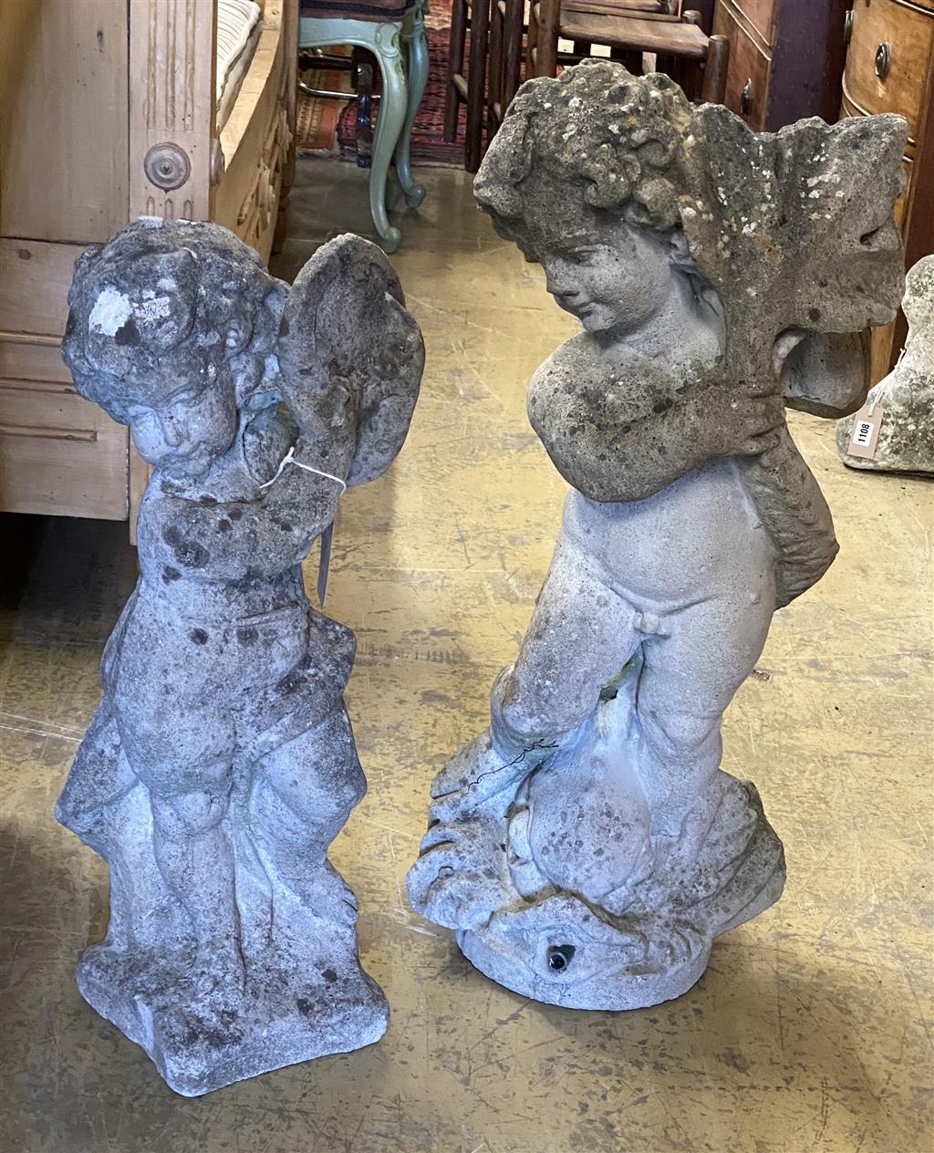 Two reconstituted stone garden cherub ornaments, larger 70cm high